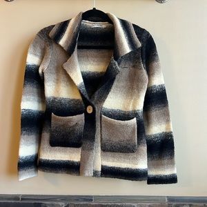 My Tribe short cardigan. Tan, beige, black. Snap button closure. S. Machine wash